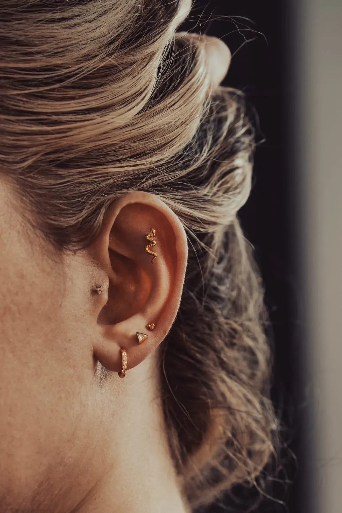 Artisan crafting luxury jewelry with precision tools